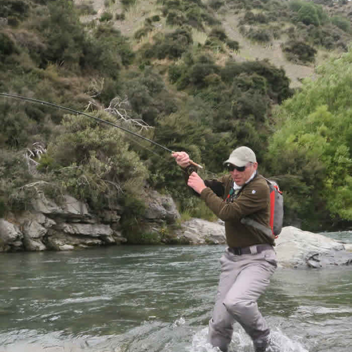 New Zealand Fly Fishing Escapes Trout Angler in Action
